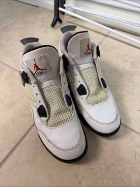 Jordan White and Black Retro 4 Sneakers with Red Jumpman